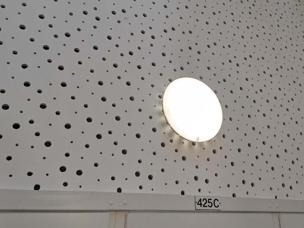 Inspectiefoto van led-wandarmaturen, rond met bewegingsmelder bij interieur (portieken)